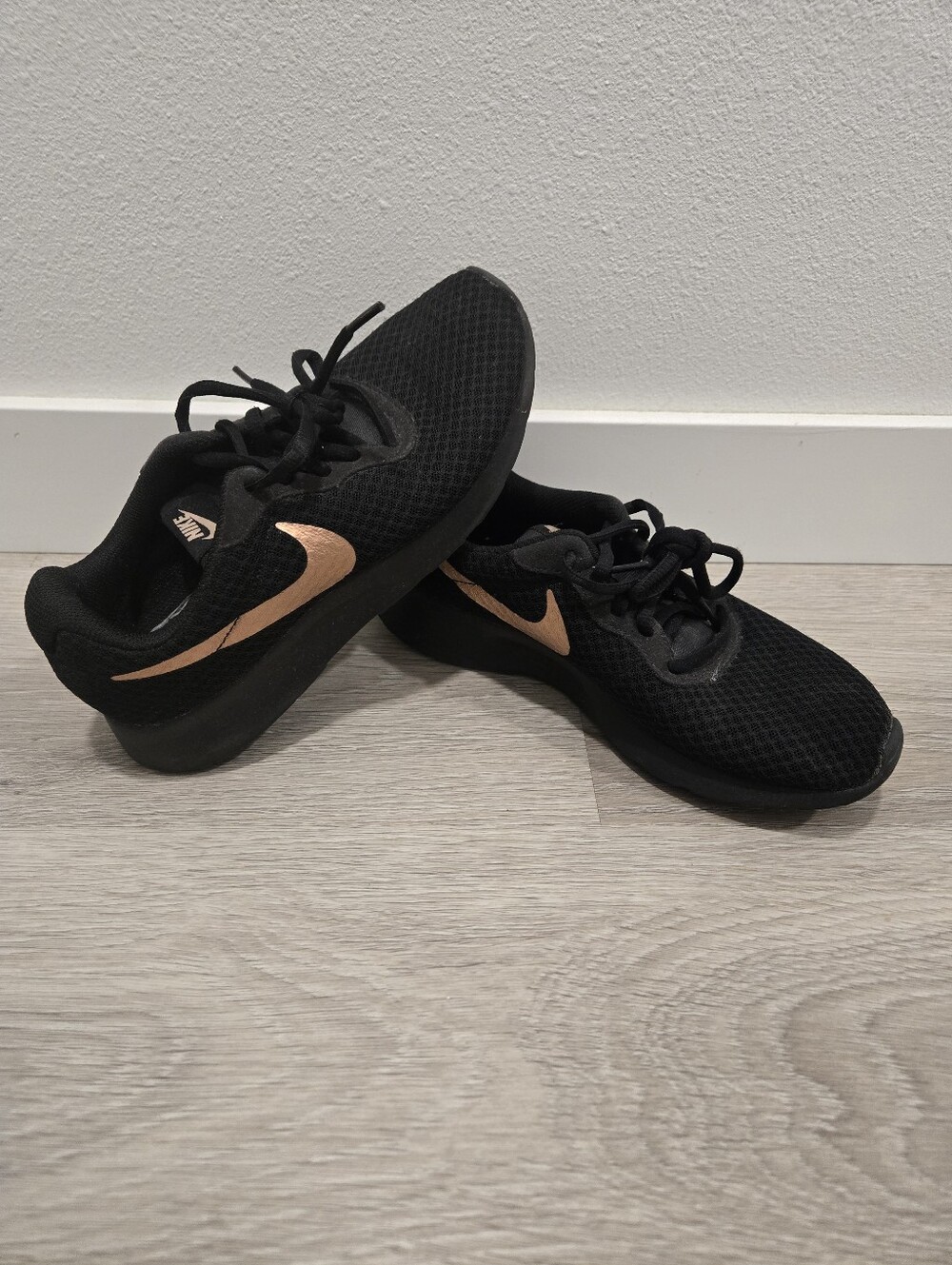Nike Women’s Black Mesh Runners with Metallic Rose Swoosh
